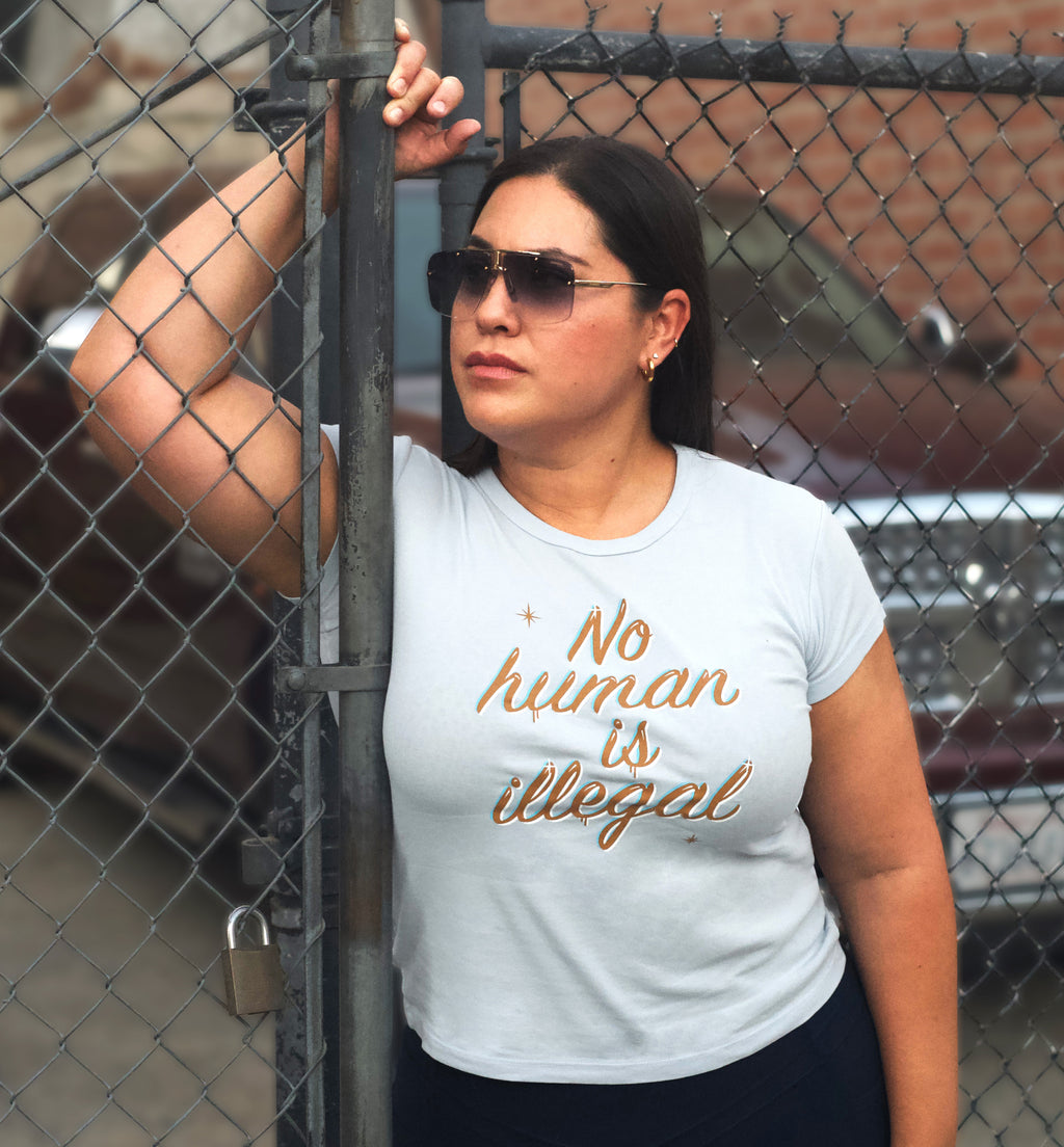 No Human is Illegal Baby Tee
