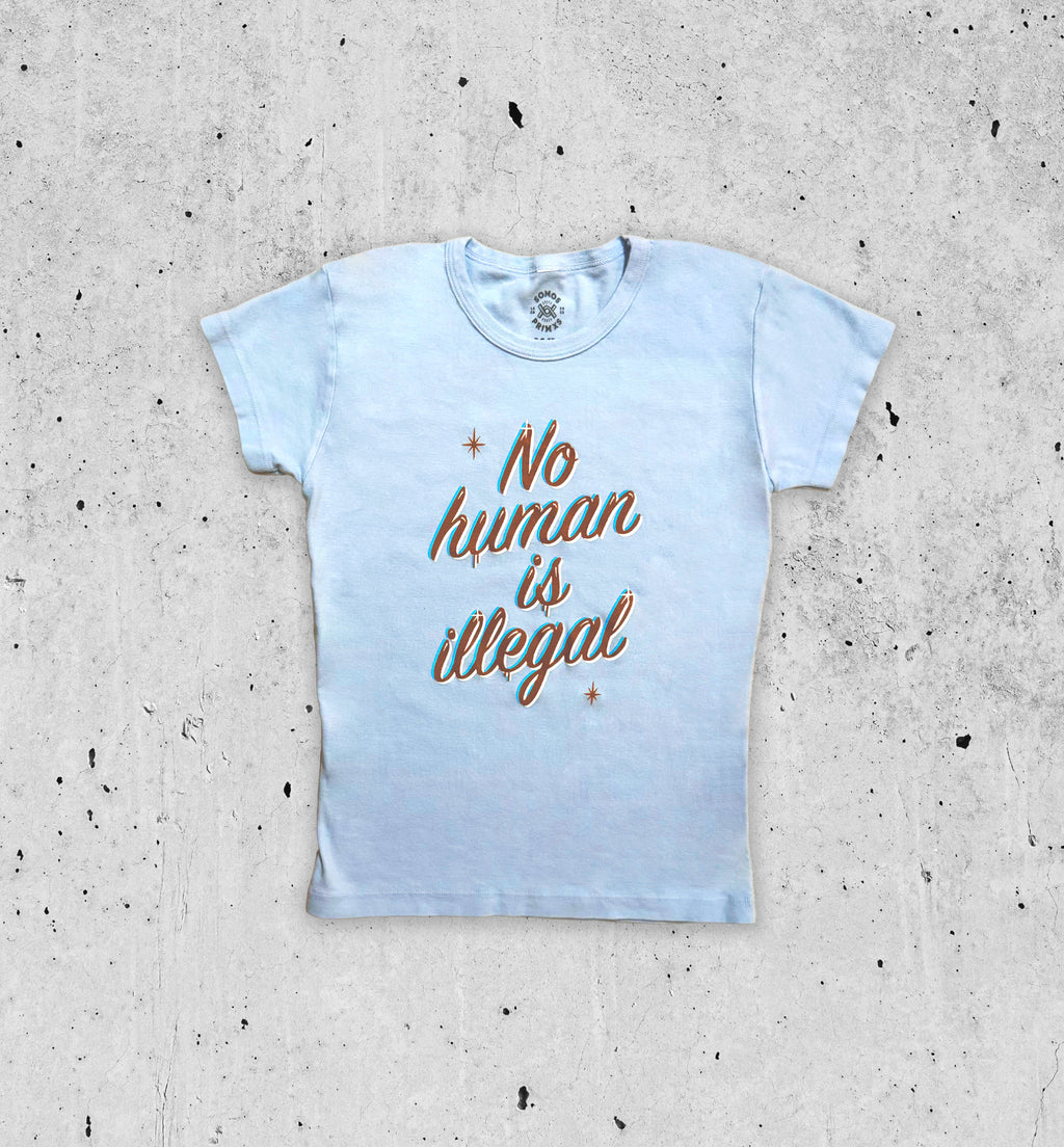 No Human is Illegal Baby Tee